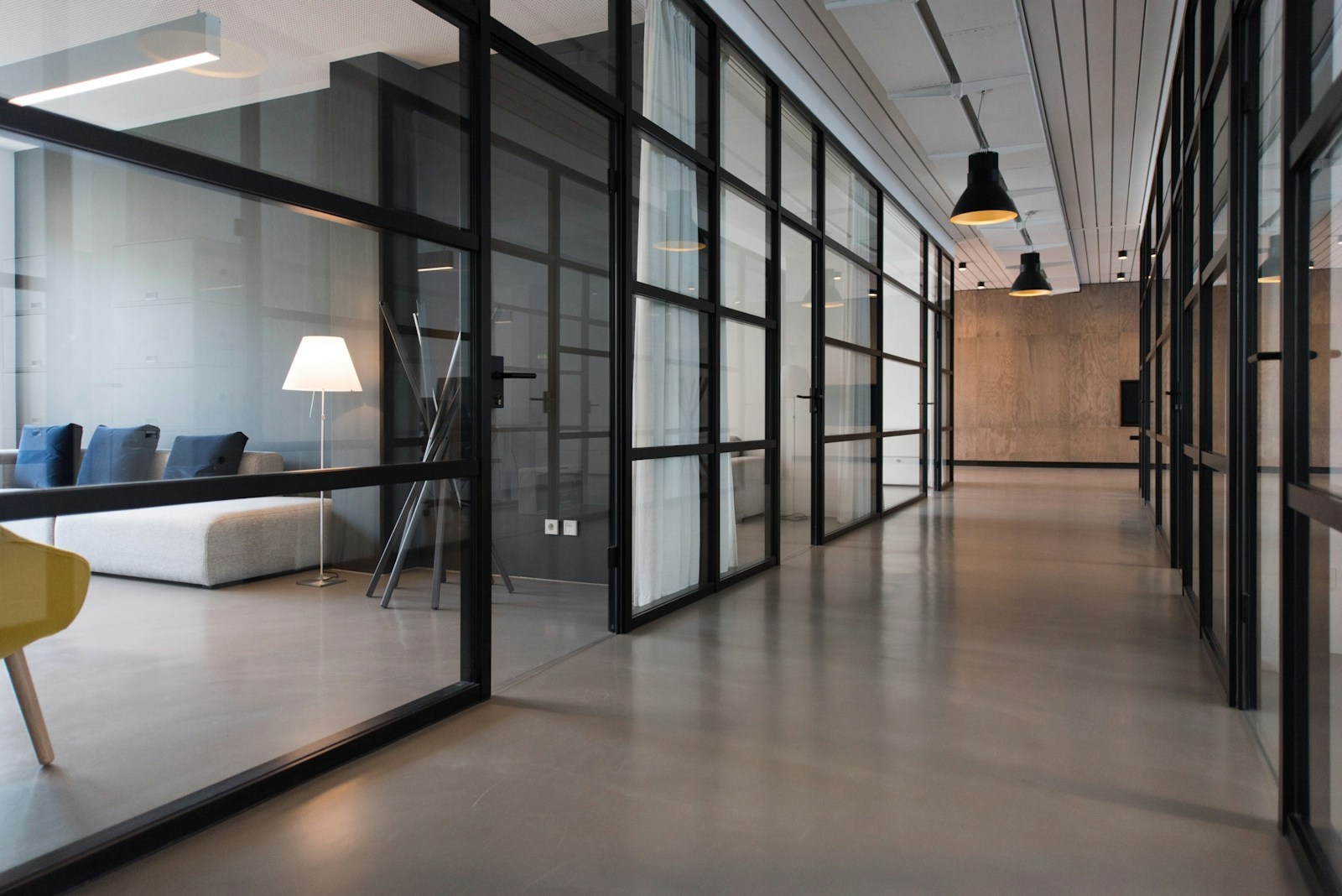 Bright office workspace with desks and business computers